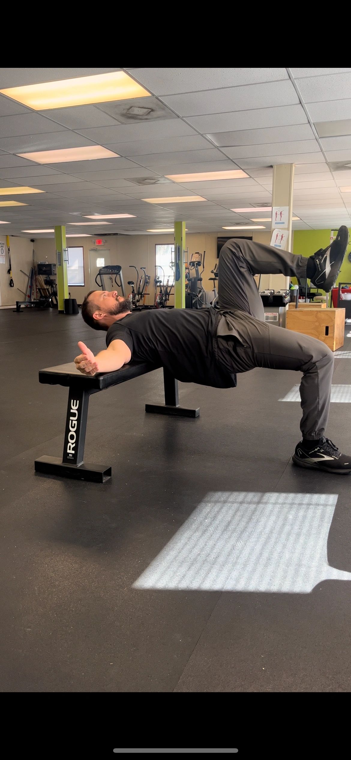 Athlete performing bench-supported strength exercise
